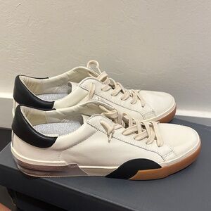 New Balance White and Black Sneakers